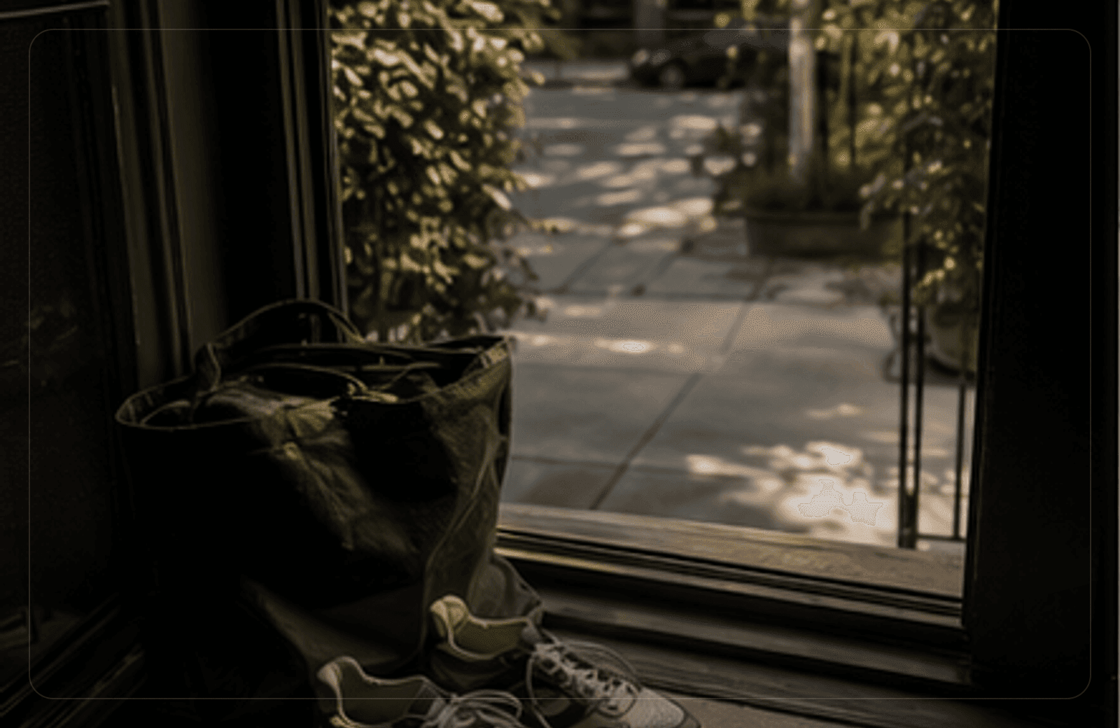 Shoes near an open doorway, ready for a tiny outside return.